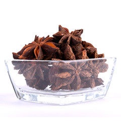  Anise in a glass bowl on a white background
