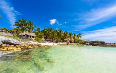 Recreation at paradise beach resort with turquoise waters of Caribbean Sea at Tulum, close to Cancun, Riviera Maya, tropical destination for vacation, Mexico