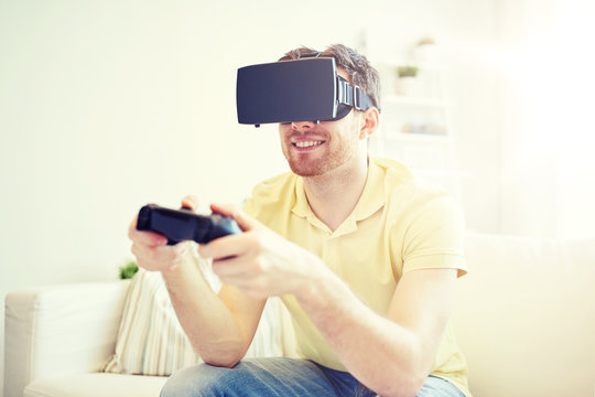 man in virtual reality headset with controller