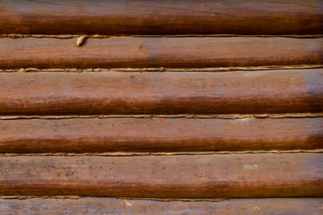 Wall made of wooden logs, background and surface