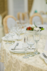 banquet hall of the restaurant, beautifully decorated tables with food