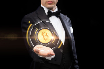 close up of magician with bitcoin symbol