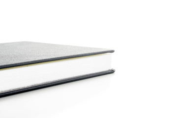 Image of black book diaries over white background