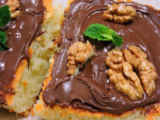 Fresh homemade cheese cake with chocolate paste and walnuts. Delicious homemade cakes.