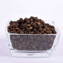  pepper peas in a glass bowl on a white background