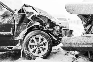 Fototapeta na wymiar Car accident on winter road, black and white