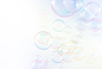 Abstract soap bubbles floating in the air.