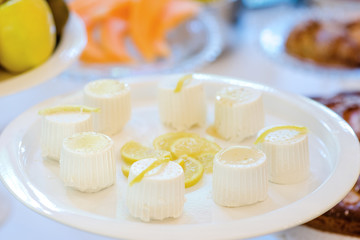 White little ricotta cheese on a plate