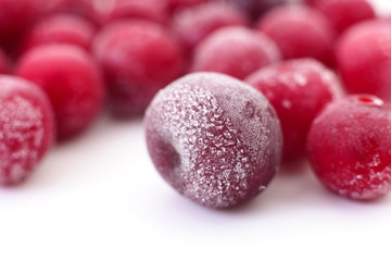 Group of frozen cherries.