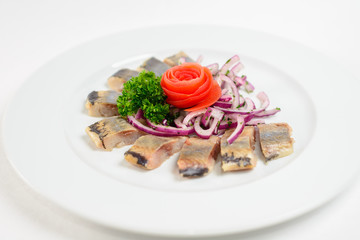Herring with herbs and onions carrot flower decoration