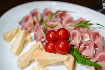 Ham with slices of cheese, close up