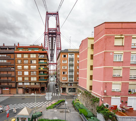 Bizkaia suspension bridge behind buildings