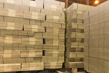 Stack of Corrugated paperboard texture in warehouse for industria