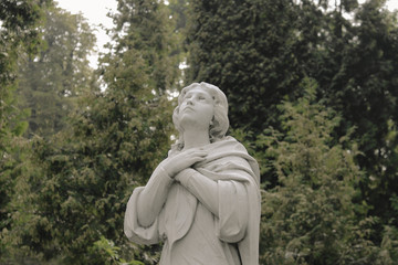 Fototapeta na wymiar An old sculpture in one of the parks of Lviv (Ukraine)