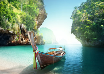 Plakat boat on the beach , Krabi province, Thailand