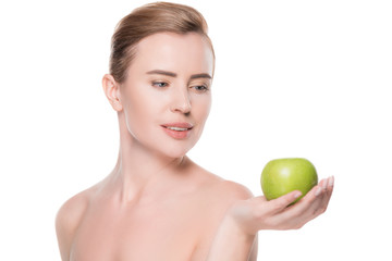 Female with clean skin holding apple isolated on white