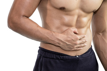 Fototapeta na wymiar Muscular man having stomachache, Health concept