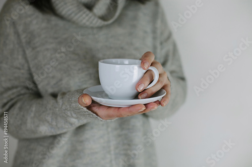 Breakfast And Coffee Theme Woman S Hand Holding White Empty Coffee Or Tea Cup Advertising Coffee Or Tea Wall Mural Kolesnikov Breakfast And Coffee Theme Woman S Hand Holding White Empty Coffee Or Tea Cup Advertising Coffee Or Tea Wall Mural Kolesnikov