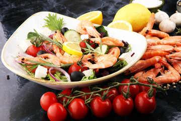 tasty meal with fresh and healthy prawn salad and vegetables. Prawns Langostino Austral.