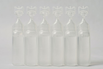 Plastic bottle of serum saline.