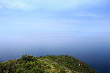 green hill on blue sky background