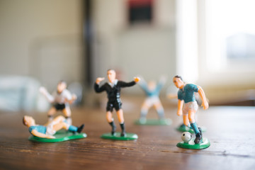 plastic figurines of soccer players
