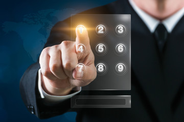 Man using virtual technology as phone number keyboard