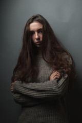 Woman with long hair in studio