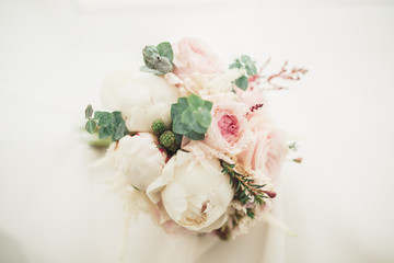 Beautiful wedding bouquet with different flowers, roses