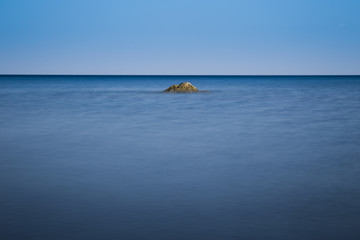 Nice simple sea long exposure, central composition, abstaract image