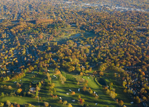 Aerial view of autumn colors and golf course