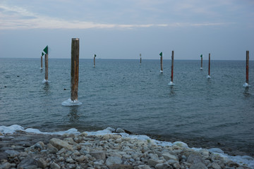 icy stakes in lake of constance