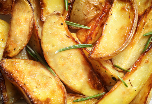 Tasty potato wedges, closeup