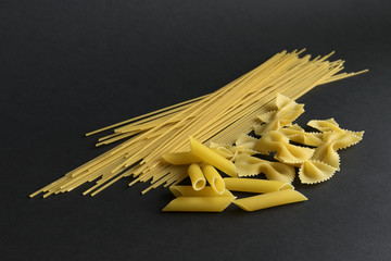 pasta and spaghetti on a black background