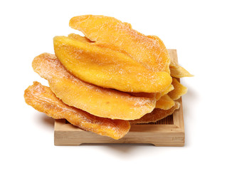 Dried mango slices isolated on white background