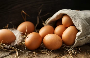 Zelfklevend Fotobehang Frische braune Eier © jd-photodesign