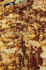 texture of rusty iron, cracked paint on an old metallic surface, sheet of rusty metal with cracked and flaky paint,  abstract rusty metal texture, rusty metal background for design with copy space