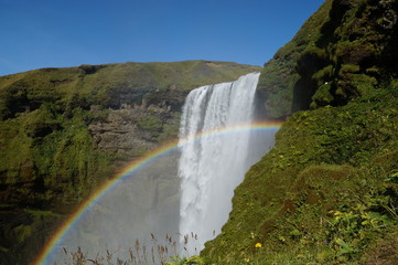 Rainbow at a waterfall in Iceland - 194478705
