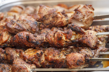 Barbecue grill-barbecue grill. appetizing shish kebab on metal grill. kebabs cook on charcoal in the open air. Marinated meat.