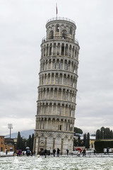 Fototapeta na wymiar The Leaning Tower of Pisa with snow, Tuscany, Italy