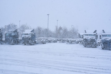 Fototapeta na wymiar Snow-covered cab of the truck