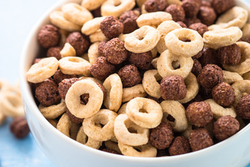 Healthy cereal breakfast on blue. 