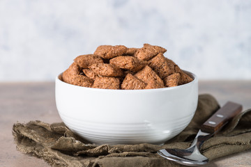Chocolate pillows in white bowl. 