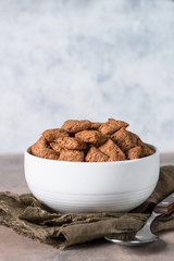Chocolate pillows in white bowl. 