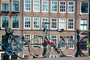 Fototapeta na wymiar Bicycles on the bridge in Amsterdam, Netherlands