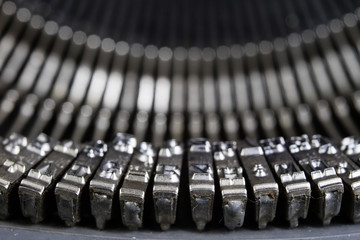 Typewriter shown in macro technology. A mechanical device for printing text.