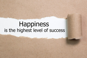 Happiness Is The Highest Level Of Success appearing behind torn paper.  - obrazy, fototapety, plakaty