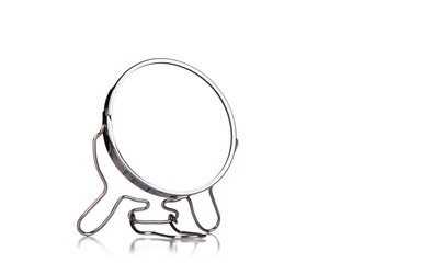 Fototapeta premium silver makeup mirror isolated on white