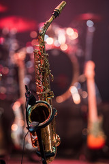 saxophone on the stage in the background other instruments