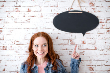 red hair business woman showing copy space